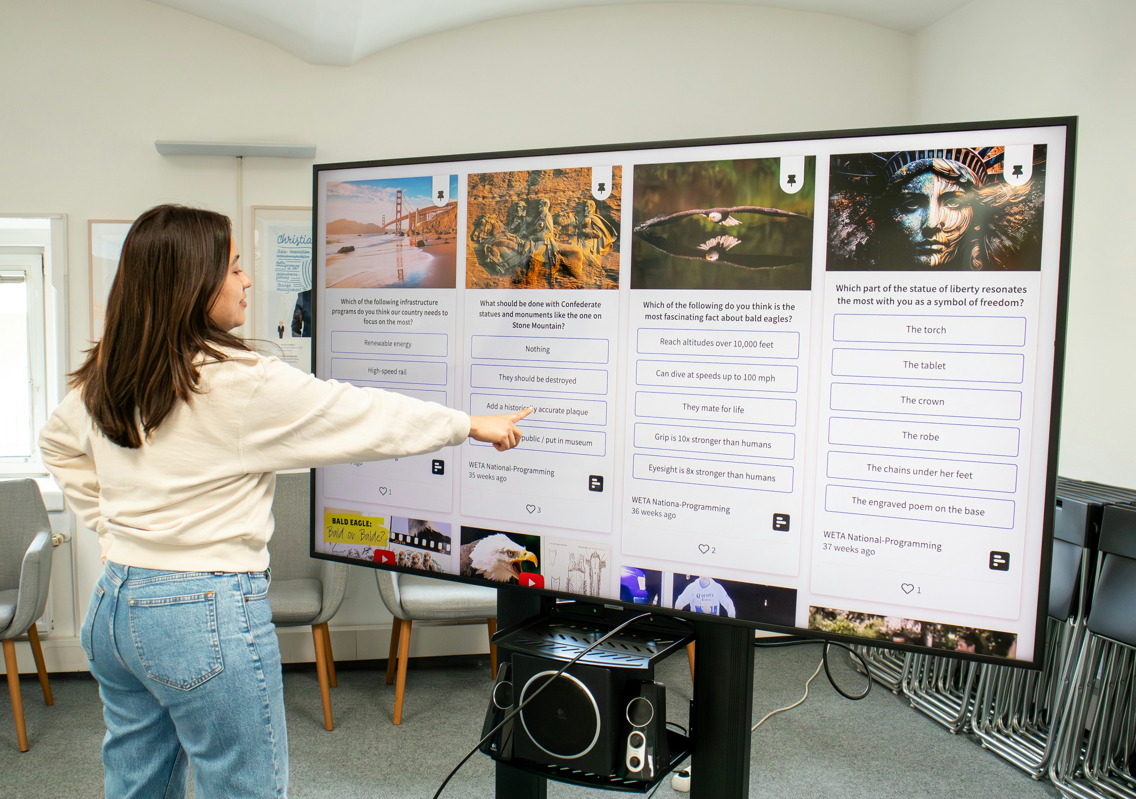 Student interacting with AI educational display